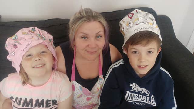 Caroline Storey, 35, with children, Kian Storey, 10, and Emily Storey, eight.
