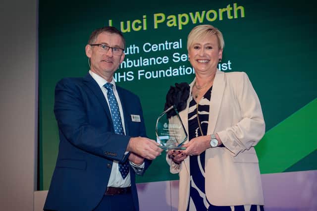 Luci Papworth receives her 'Outstanding Service Award'