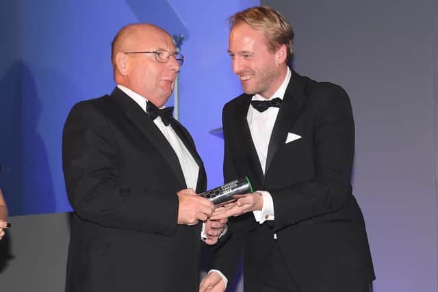 Accrington chairman Andy Holt, left, on stage during the Football Business Awards in 2018. Picture: Stuart C. Wilson/Getty Images for Football Business Awards