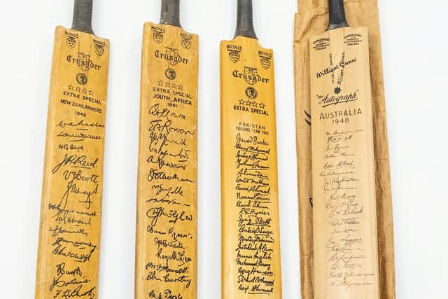 Autographed bats - with facsimile signatures - are among Derek Shackleton's memorabilia up for auction next month. Picture: Hansons