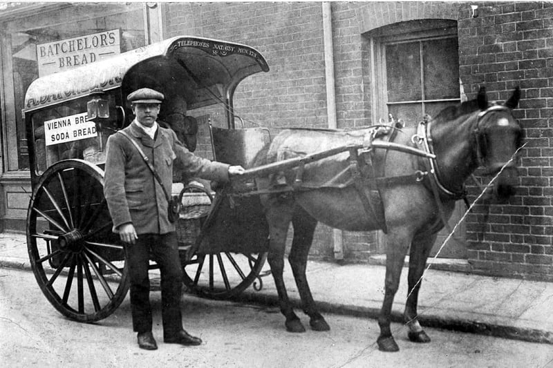 Bread delivered by horse and cart. Jack Wilcox delivering for Batchelor's Bakers. Sent in by Gerald Dilley of Waterlooville, he says he does not know  much about the photo except that Jack was his uncle.