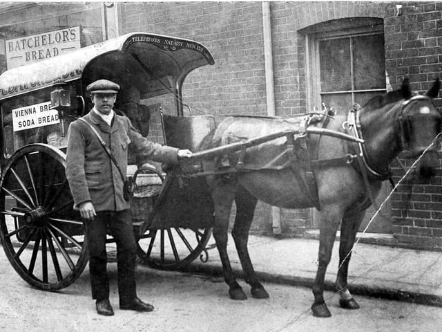 Bread delivered by horse and cart. Jack Wilcox delivering for Batchelor's Bakers. Sent in by Gerald Dilley of Waterlooville, he says he does not know  much about the photo except that Jack was his uncle.