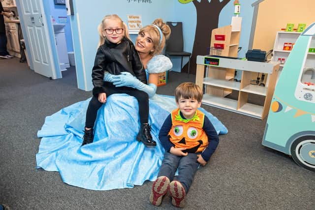 Sofia Robinson (5) and Noah Lock (3) with princess Melissa Jeffrey (26). Picture: Mike Cooter (011121)