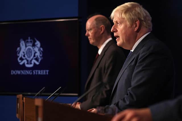 Chief Medical Officer for England Chris Whitty and Britain's Prime Minister Boris Johnson attend a media briefing on the latest Covid-19 update, at Downing Street. Picture: Dan Kitwood/POOL/AFP via Getty Images