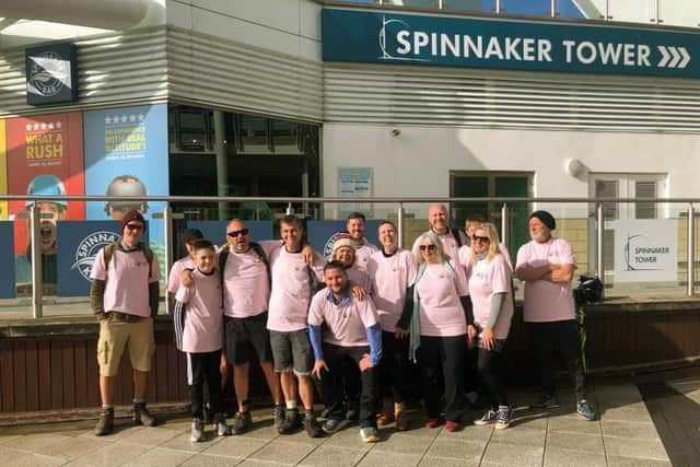 Tower to Tower charity walk to raise money for chemotherapy patients
Caption: Group reach Spinnaker Tower after Tower to Tower charity walk raising money for chemotherapy patients
Picture: Jenna Murray