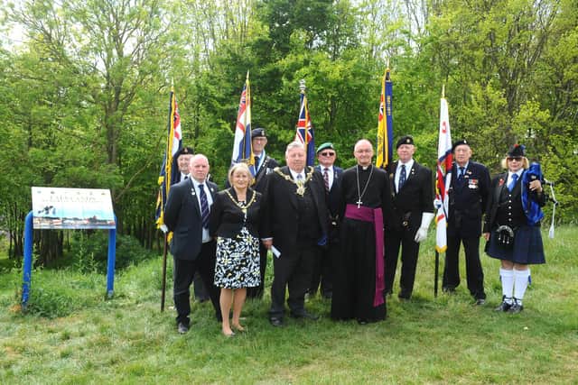 The Royal Naval Association held a dedication cermony with the Lord Mayor of Portsmouth Frank Jonas, at the Falklands Memorial Plantation on Portsdown Hill Road, Portsmouth, on Monday, May 9.

Pictured is: (back) Standard bearers with (right) piper Caroline Henton and (front l-r) David MacAskill, The Mayoress of Portsmouth Joy Maddox, the Lord Mayor of Portsmouth Frank Jonas and Bishop Paul Miles-Knight.

Picture: Sarah Standing (090522-3621)
