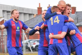 Harry Birmingham (arm around No 14's neck) celebrates Harry Sargeant's goal that clinched US Portsmouth's 2-0 FA Vase quarter-final victory over Flackwell Heath last weekend. Picture: Martyn White.