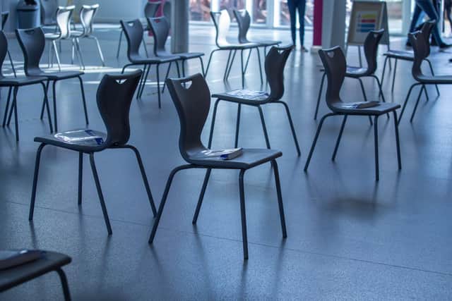 Protective face visors placed on chairs at Portsmouth College.

Picture: Habibur Rahman