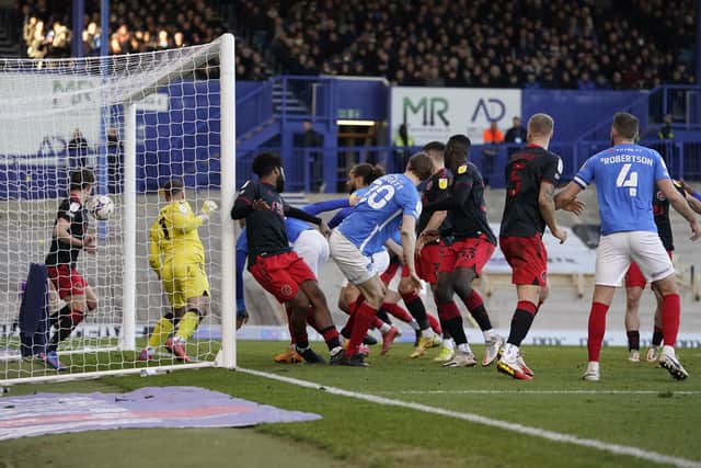 Marcus Harness gets the final touch on Ronan Curtis' left-wing corner to net Pompey's second of their comeback in the 3-3 draw against Fleetwood. Picture: Jason Brown/ProSportsImages