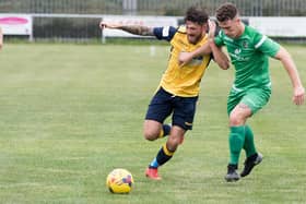 Tyler Giddings, left, pictured in action for Moneyfields in the Southern League, scored his first Baffins goal in the win against Laverstock & Ford.
Picture: Duncan Shepherd