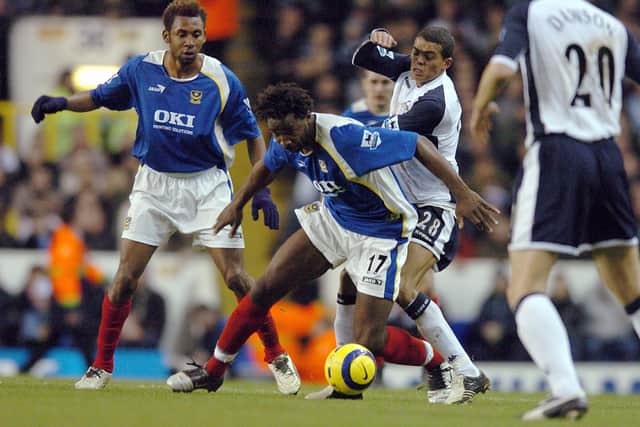 Vincent Pericard tussles with Spurs' Jermaine Jenas at White Hart Lane in December 2005 during Harry Redknapp's first match back with Pompey. Picture: Matt Scott-Joynt