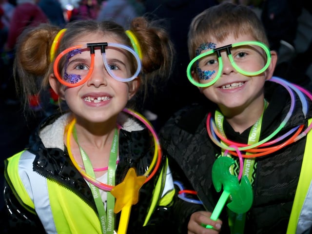 Lottie Stamp, 6, and Louis Stamp, 7, who did the walk in memory of their grandfather. Starlit Walk in aid of Rowans Hospice, Portsmouth Historic Dockyard, HM Naval Base PortsmouthPicture: Chris Moorhouse (jpns 261023-17)