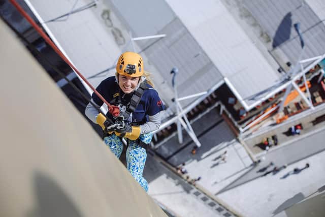 23/08/2017
Spinnaker Tower - Abseiling.
All Rights Reserved - Helen Yates- T: +44 (0)7790805960
Local copyright law applies to all print & online usage. Fees charged will comply with standard space rates and usage for that country, region or state.:People abseiling down the Spinnaker Tower.