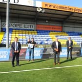 Hawks officially unveil their new 3G pitch at the newly-named Draper Tools Community Stadium. From left - Alan Mak (MP for Havant), Joe Drape (Draper Tools director, with his son Leo), Derek Pope (Hawks chairman), Graham Wade (Draper Tools MD), Tom Draper (Draper Tools, director), Prad Bains (Mayor of Havant) and Charlotte Chandler (Hawks commercial/marketing manager). Picture: Sarah Standing
