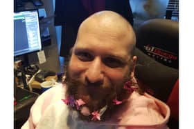 Dan Davies after shaving his head during the 24-hour gaming marathon