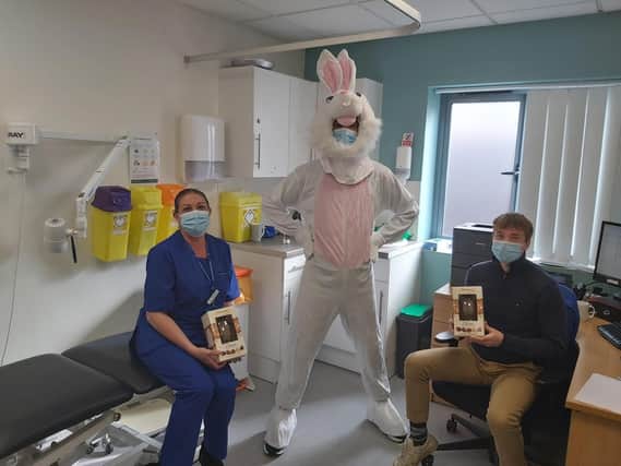 Kingston Crescent Surgery in North End,  health care assistant Rachel Smith, who lives in Copnor,  and volunteer Harry Kyd who lives in Portsmouth,  received their eggs from the Easter Bunny
