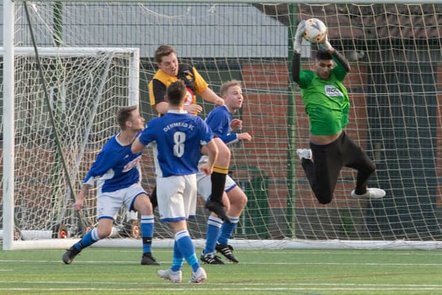 The Mayor of Havant, Prad Bains, in goalkeeping action for Denmead in the Hampshire Premier League. Picture: Keith Woodland