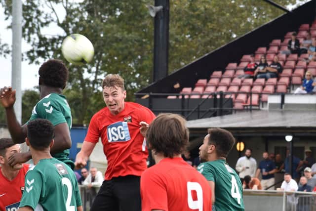 Fareham defender Archie Willcox about to head the ball. Picture: Paul Proctor
