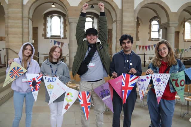 City of Portsmouth College students show off their work at Portsmouth Cathedral.