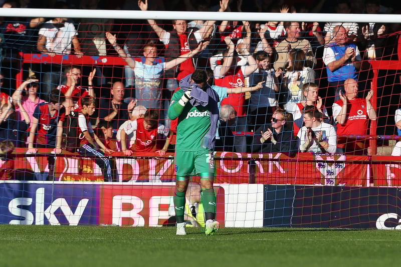 A tough start to the 2013-14 season was compounded by a dismal 4-2 defeat at York which effectively destroyed the Pompey career of John Sullivan. The keeper endured a nightmare match, including conceding three goals in eight minutes, and looked shot to pieces at the final whistle. A superb Jed Wallace solo goal is forever overshadowed by his goalkeeper's display. Picture: Joe Pepler