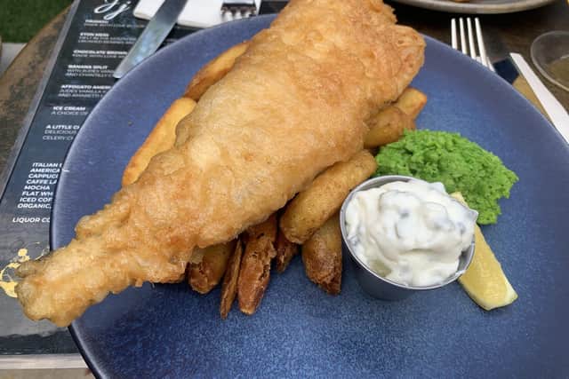 Large fish and chips with mushy peas.