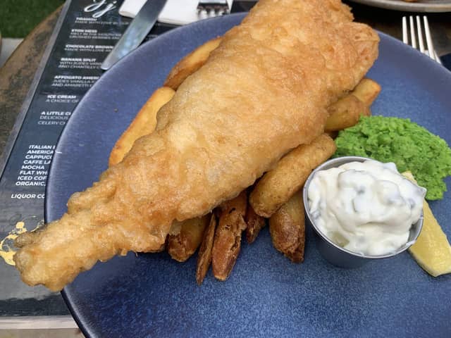 Large fish and chips with mushy peas.