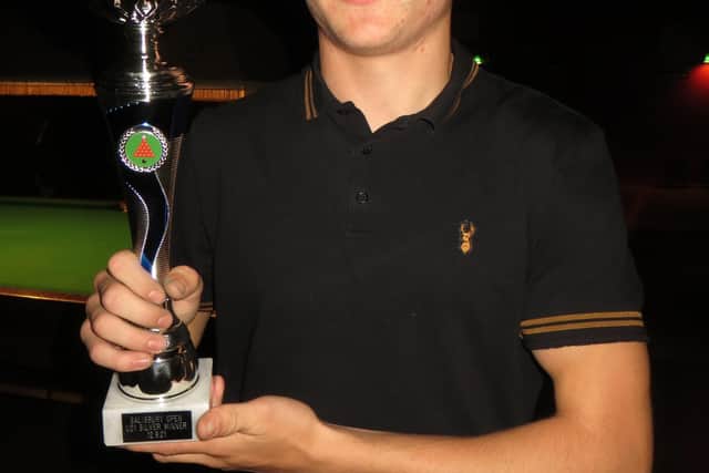 Will Forster with his Cuestars trophy