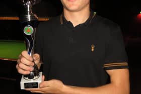 Will Forster with his Cuestars trophy