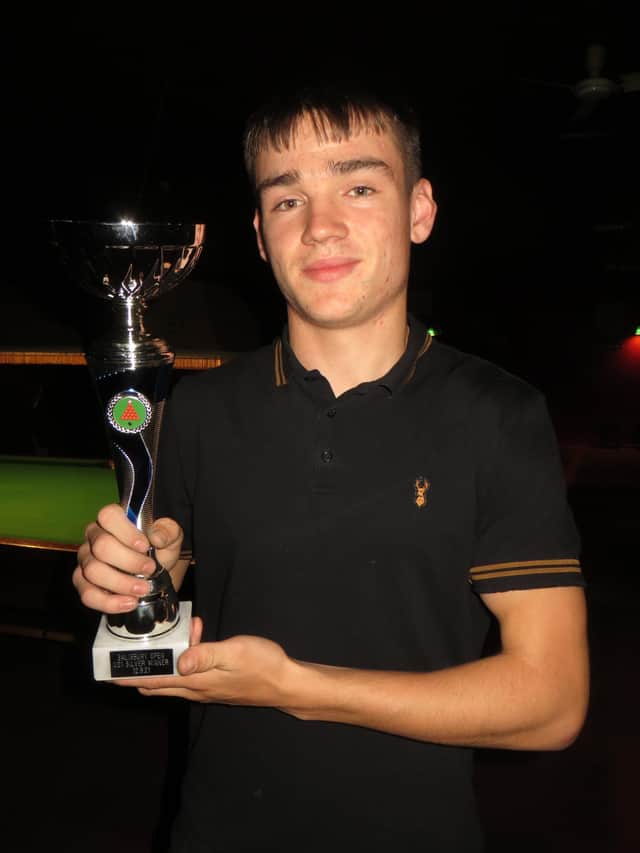 Will Forster with his Cuestars trophy