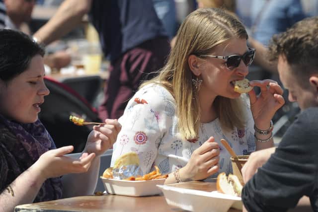 Punters enjoy a wide a variety of tasty street food at Gunwarf Quays at a previous British Street Food Awards event.
Picture: Ian Hargreaves (250519-1)