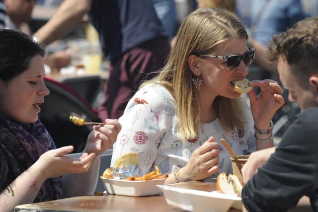 Punters enjoy a wide a variety of tasty street food at Gunwarf Quays at a previous British Street Food Awards event.

Picture: Ian Hargreaves  (250519-1)