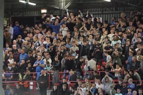 Portsmouth fans during the EFL Sky Bet League 1 match between Charlton Athletic and Portsmouth at The Valley, London, England on 17 October 2022.