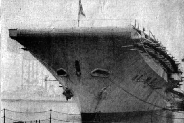Seen in dockyard hands in 1959 is HMS Centaur receiving an angled flight deck. Picture: The News archive.