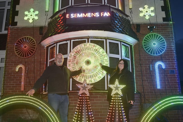 The Semmens Family Light Show in Highbury Grove in Cosham, which is a big hit in the area.

Pictured is: Myles (52) and Kelly Semmens (50).

Picture: Sarah Standing (111223-3388)