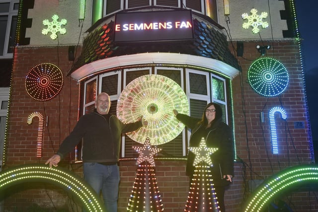 The Semmens Family Light Show in Highbury Grove in Cosham, which is a big hit in the area.
Pictured is: Myles (52) and Kelly Semmens (50).
Picture: Sarah Standing (111223-3388)