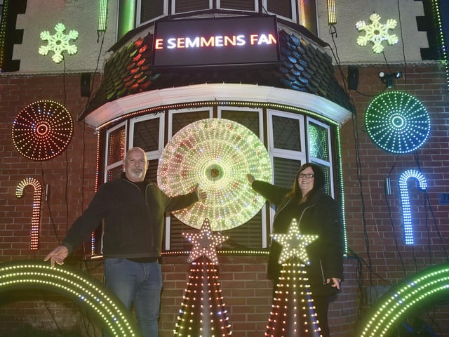 The Semmens Family Light Show in Highbury Grove in Cosham, which is a big hit in the area.

Pictured is: Myles (52) and Kelly Semmens (50).

Picture: Sarah Standing (111223-3388)