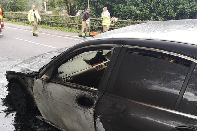 Fire damage caused to the black BMW car on Forest Road in Denmead.