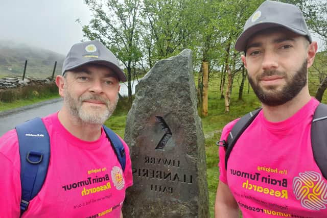 Dan Braiden, 31, of Cosham, near Portsmouth, was diagnosed with a brain tumour a year after successful treatment for testicular cancer.
Dan and his dad Shane climbing Snowdon to raise money for Brain Tumour Research.
Picture: Brain Tumour Research