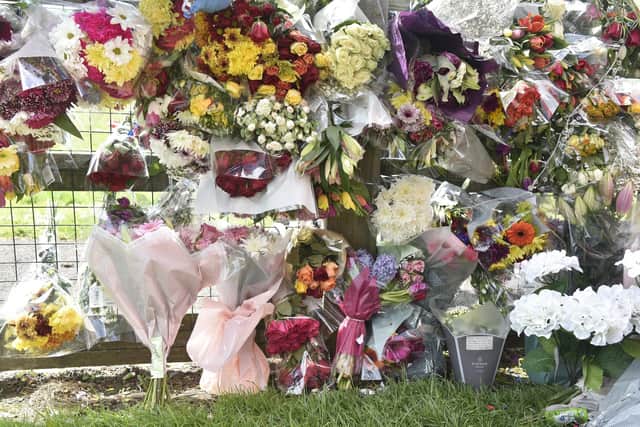 Floral tributes at Cosham Park in Cosham, Portsmouth, for Jake Norman. Picture: Sarah Standing (280423-2784)