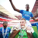 Craig MacGillivray and his Pompey team-mates bask in Checkatrade Trophy final glory at Wembley in March 2019. Picture: Joe Pepler