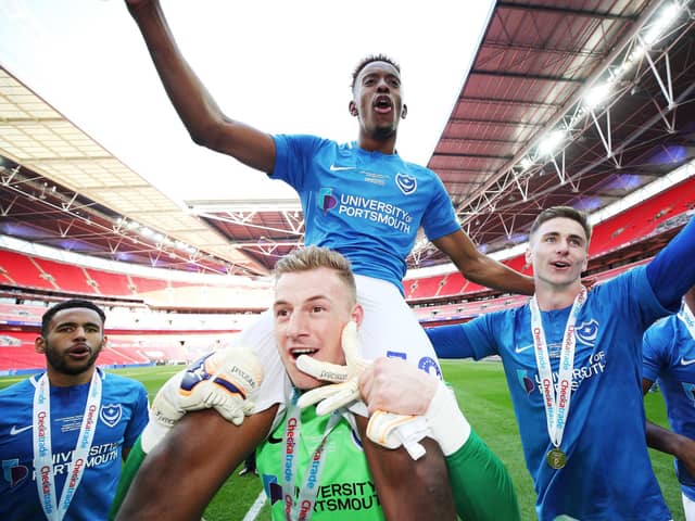 Craig MacGillivray and his Pompey team-mates bask in Checkatrade Trophy final glory at Wembley in March 2019. Picture: Joe Pepler