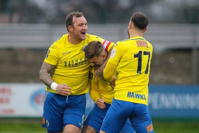 Danny Kedwell (left), Sam Magri and Josh Taylor celebrate Magri's opening goal in Hawks' win at Hemel Hempstead in January. Photo By Kieron Louloudis