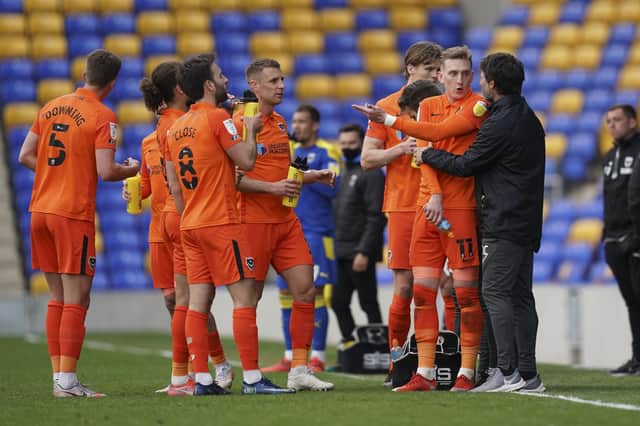 It has been an erratic and exasperating season for Pompey - yet they still have the Championship in their sights. Picture: Jason Brown/ProSportsImages