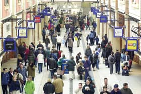 Crowds wander through Gunwharf Quays during the official opening in 2001.
Picture: Luke MacGregor