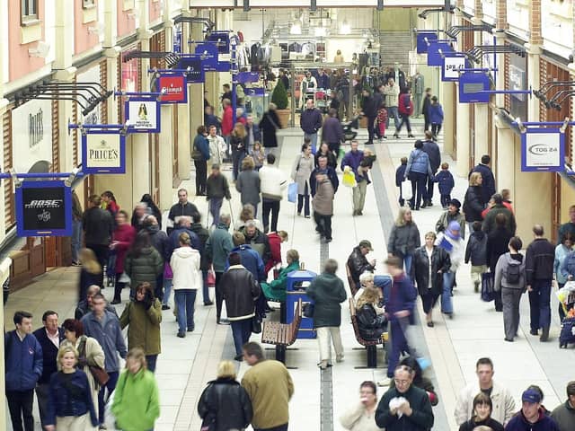 Crowds wander through Gunwharf Quays during the official opening in 2001.
Picture: Luke MacGregor