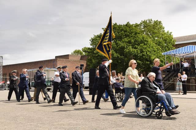 Falkland veterans march onto the parade ground at HMS Collingwood.