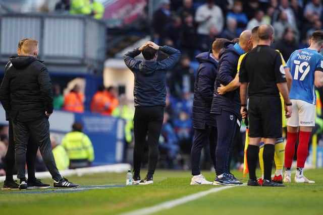 Danny Cowley can't believe it after Ollie Palmer's controversial penalty handed AFC Wimbledon the lead at Fratton Park. Picture: Joe Pepler