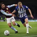 Alex Cochrane in action on Brighton debut against Aston Villa. Picture: Bryn Lennon/Getty Images