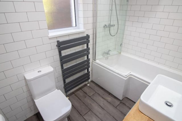 This property comes with three bedrooms, two bathrooms and a reception room as well as a garden and parking.