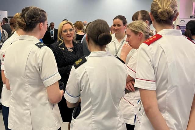Amanda Martin with nurses at QA Hospital